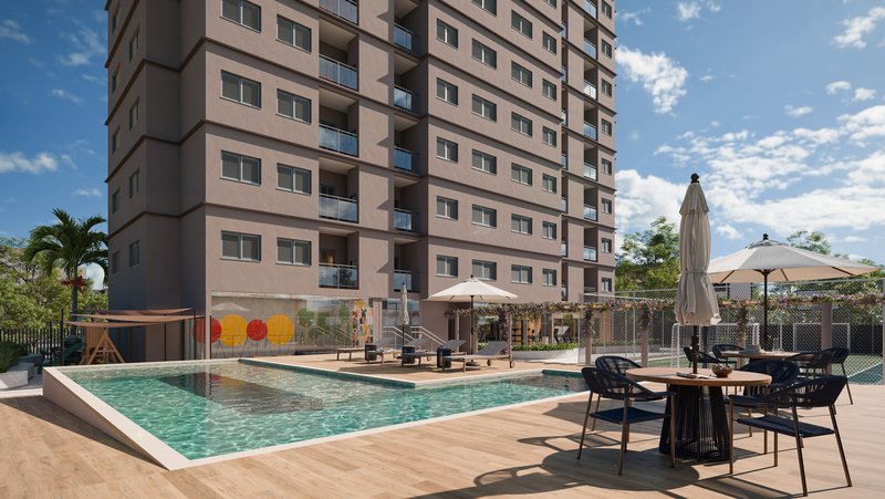 Piscina do Villa Felicità, com deck de madeira e área de estar.